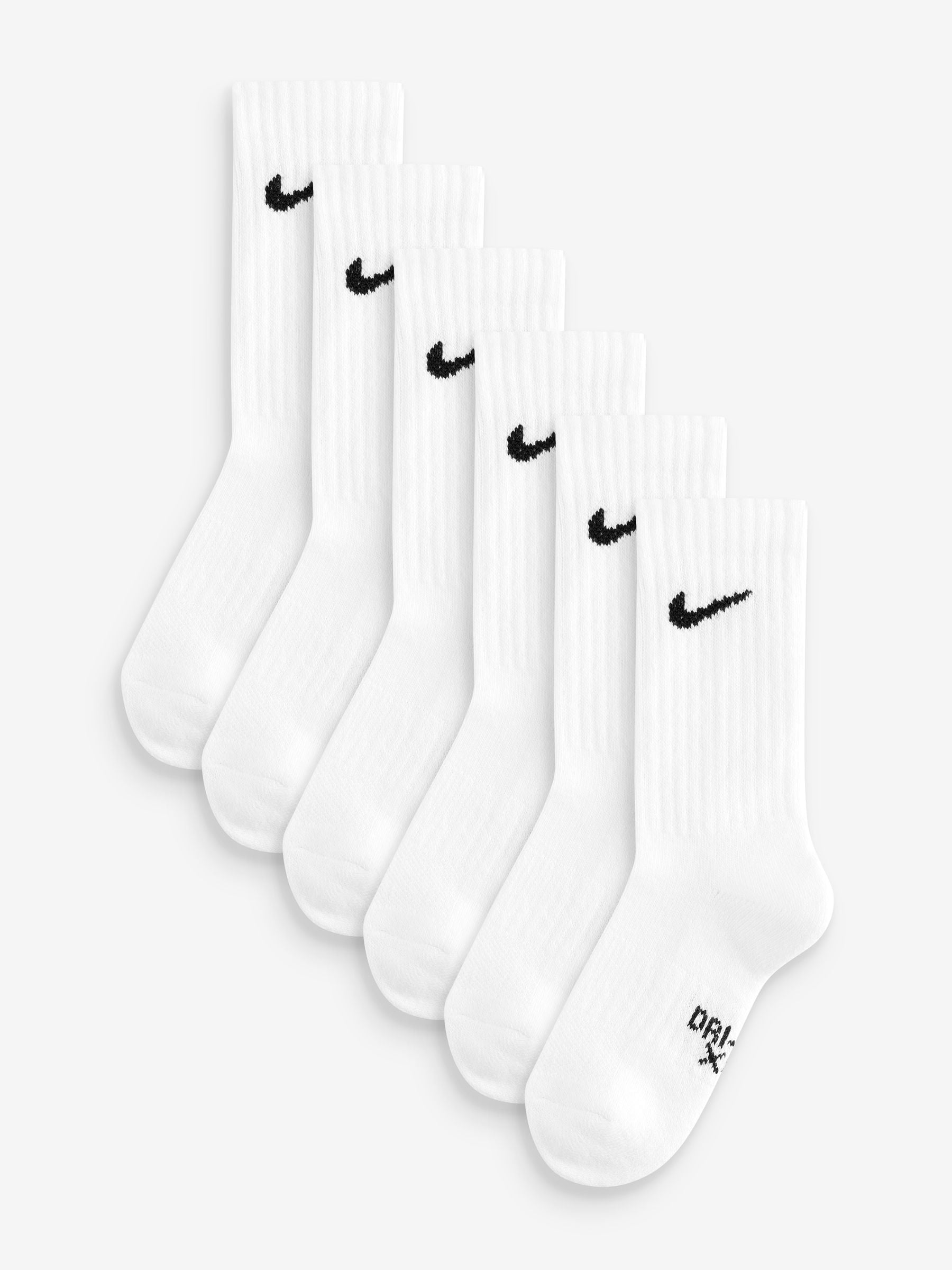 Set of white socks with black Nike logos on a white background