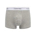 Gray boxer briefs with Calvin Klein label on a white background