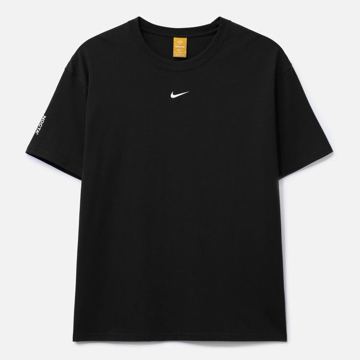 A black short-sleeve crewneck t-shirt with a small white Nike swoosh on the left chest, displayed flat against a light gray background.