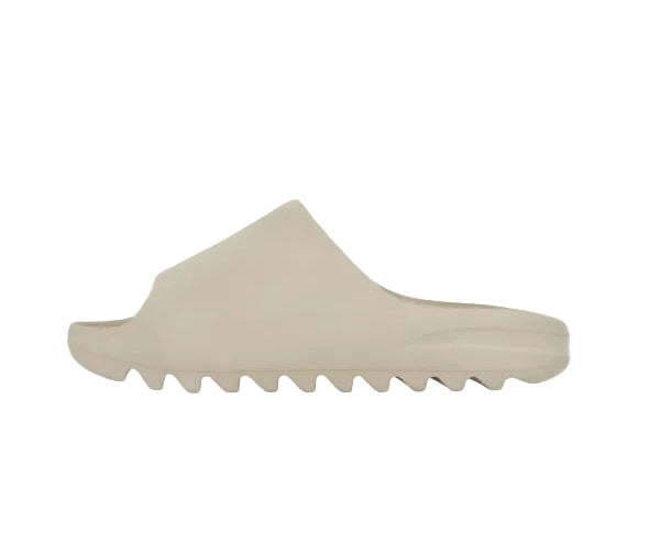 Beige slide sandal on a light beige background