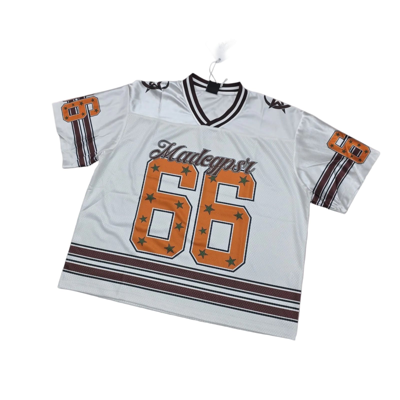 White sports jersey with orange and brown details on a light white background