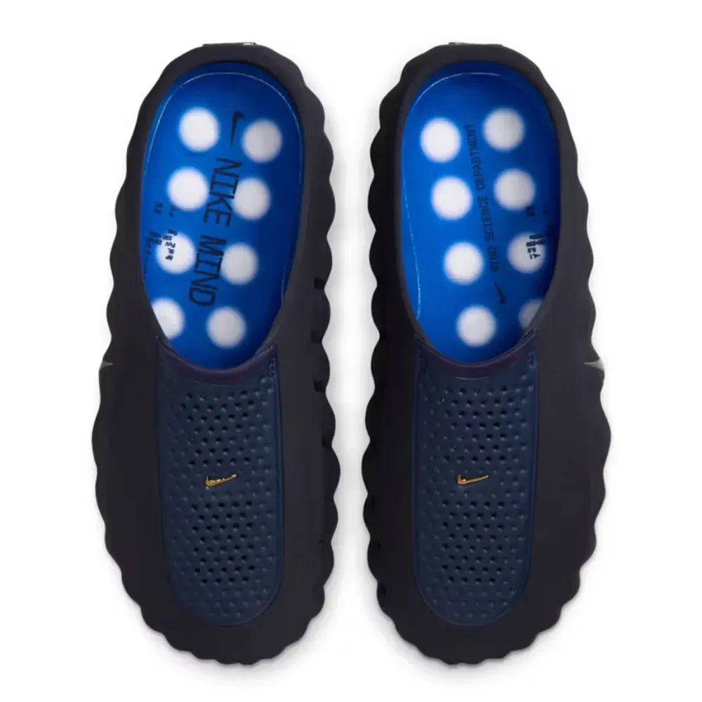 Black and blue shoe inserts with Nike logo on a white background